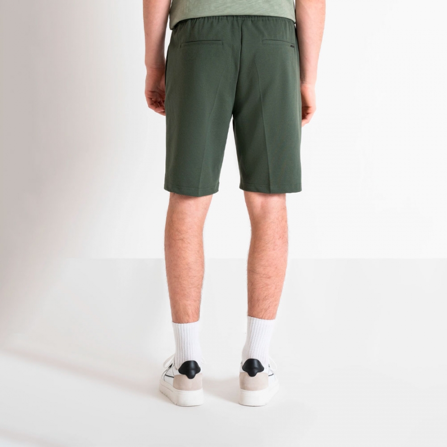 carrot-cut-gabardine-shorts-with-logo-plate