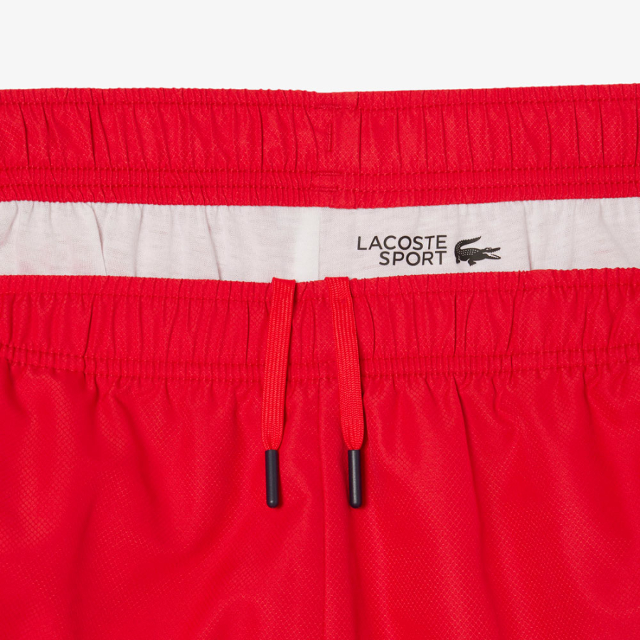 shorts-a-righe-con-logo-sportivo